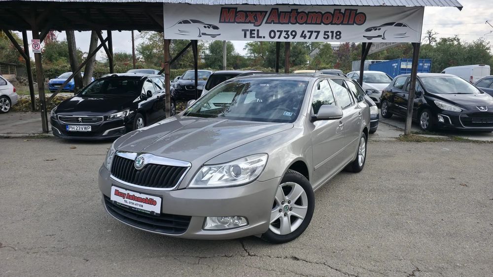 Skoda Octavia 1.6TDI,105Cp, Euro5, Dublu climatronic,Pilot, Jante