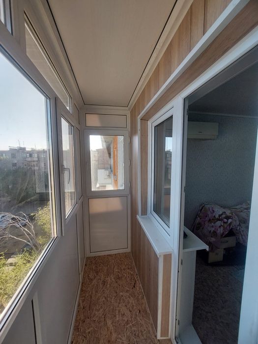 Пластиковые окна двери балконы