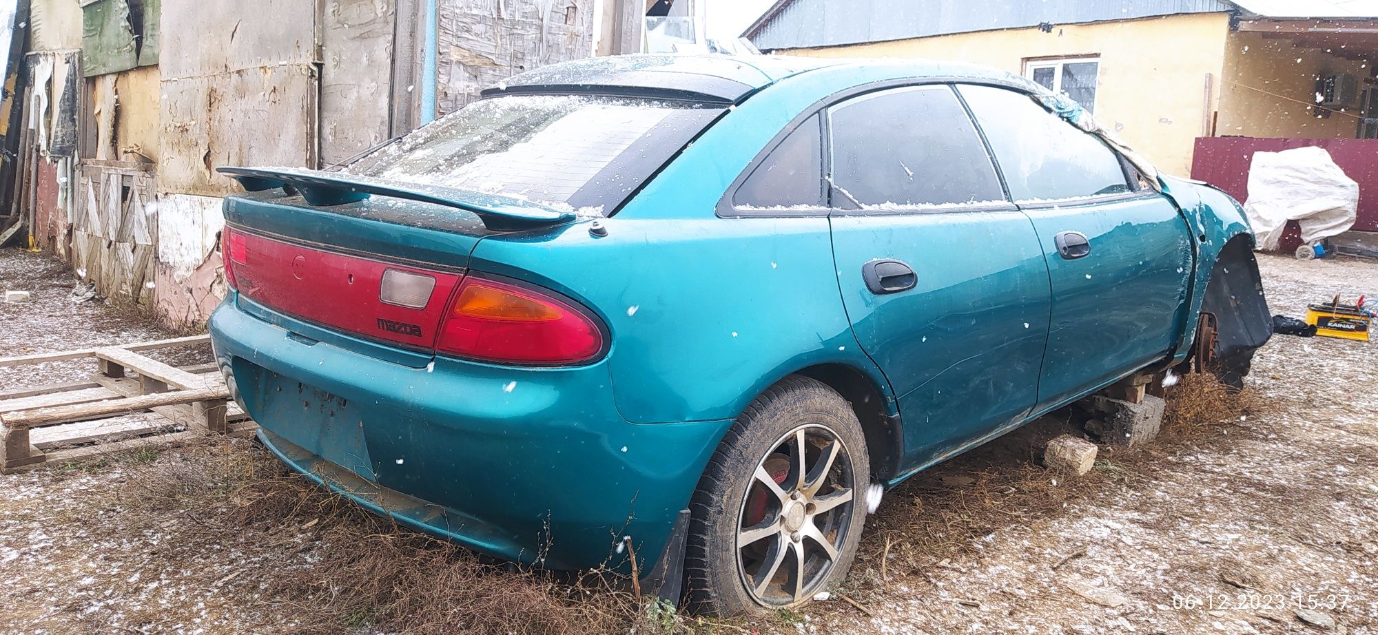 Мазда Mazda 323 95