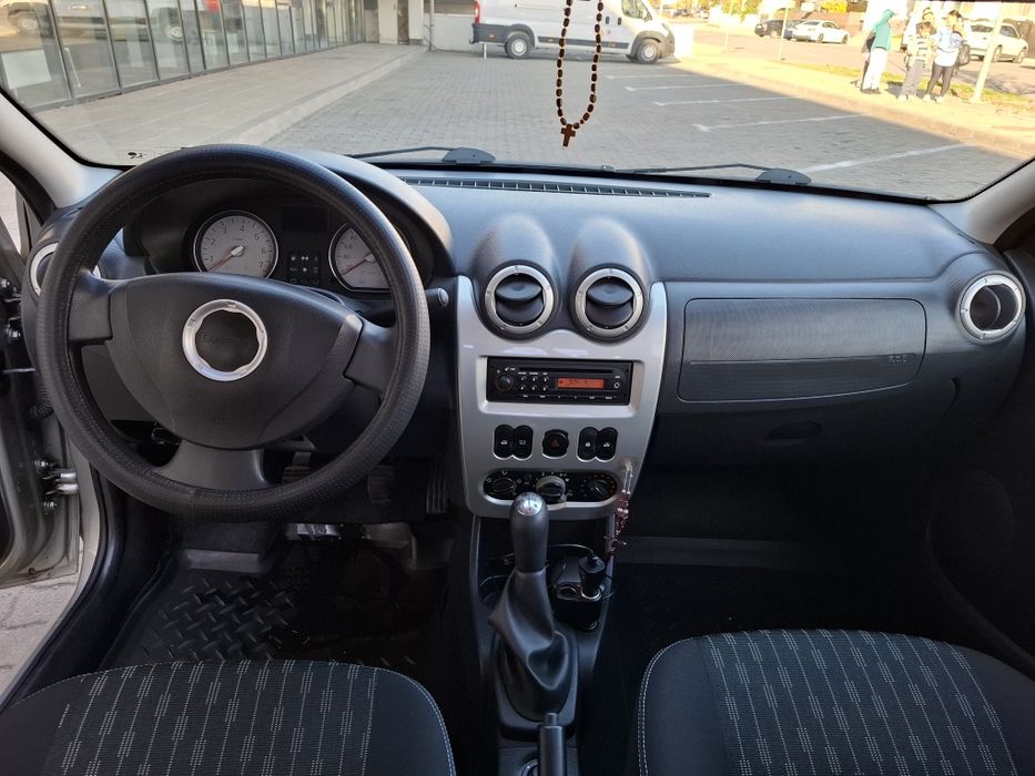 Logan decembrie 2011 doar 92700 km