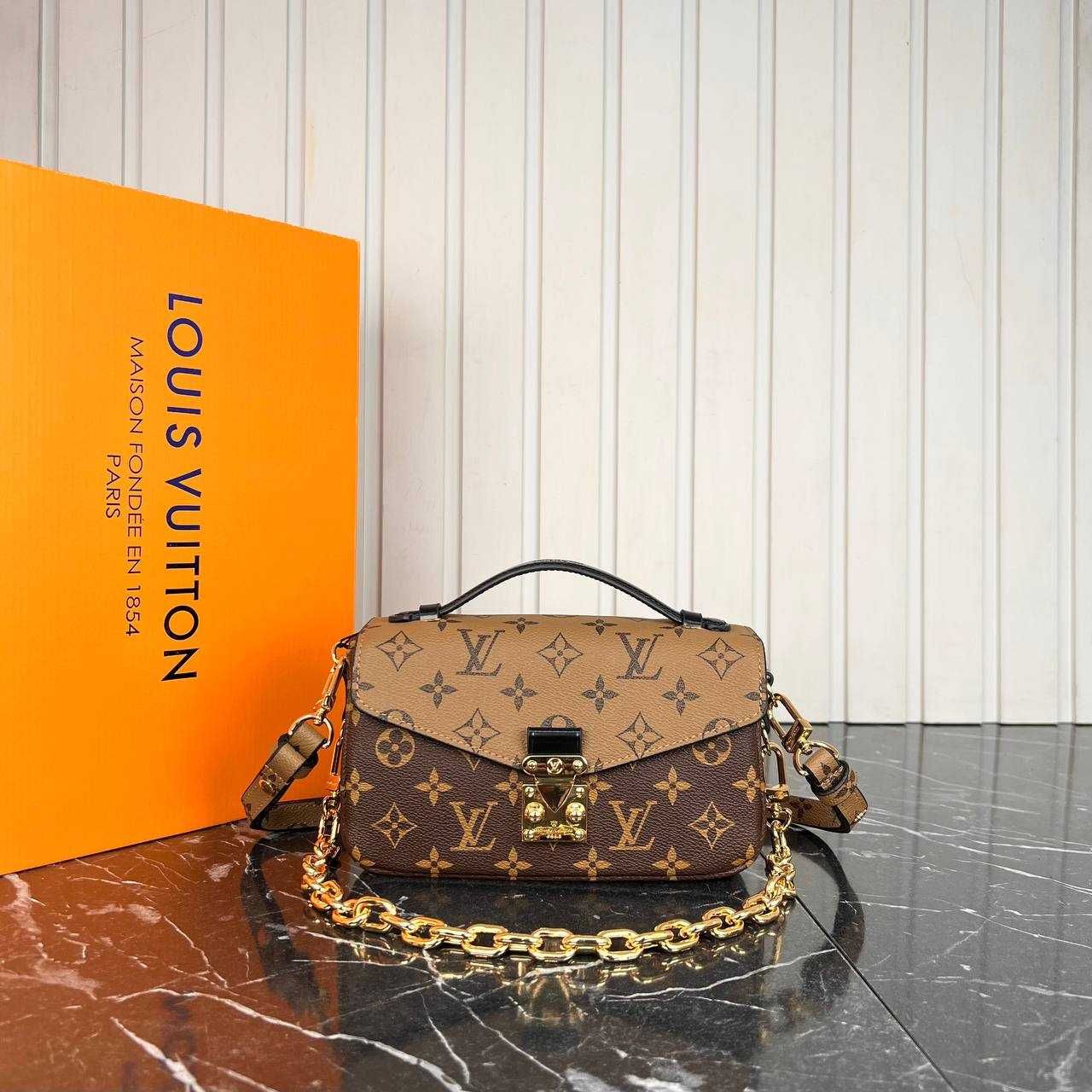 Louis Vuitton genti din piele naturala