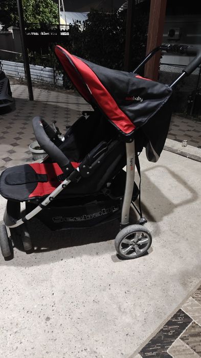 Коляска трёхколёсная