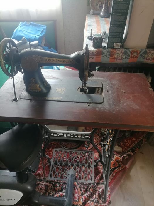 Mașină de cusut Singer