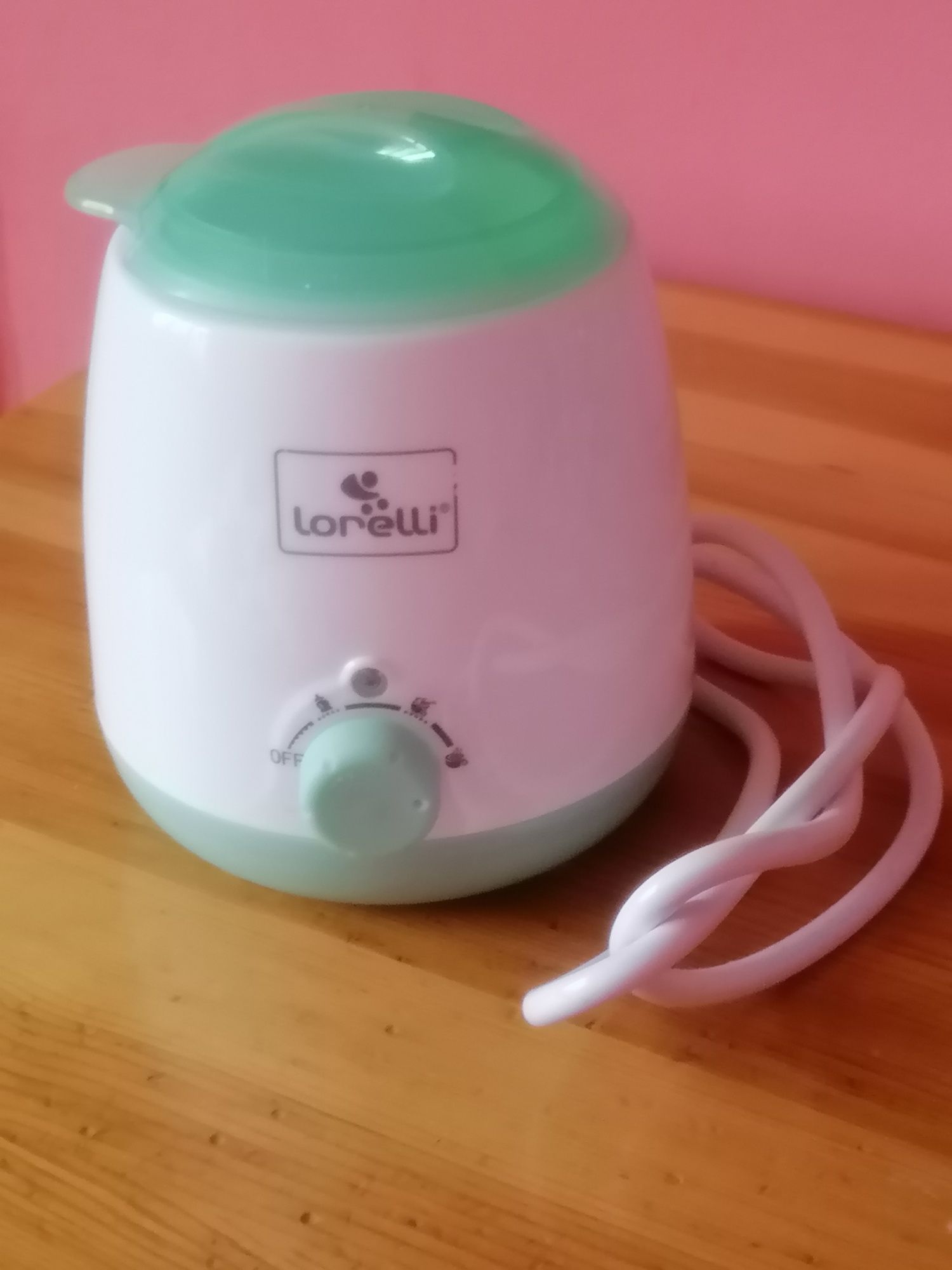 Уред за подгряване на бебешки шишета