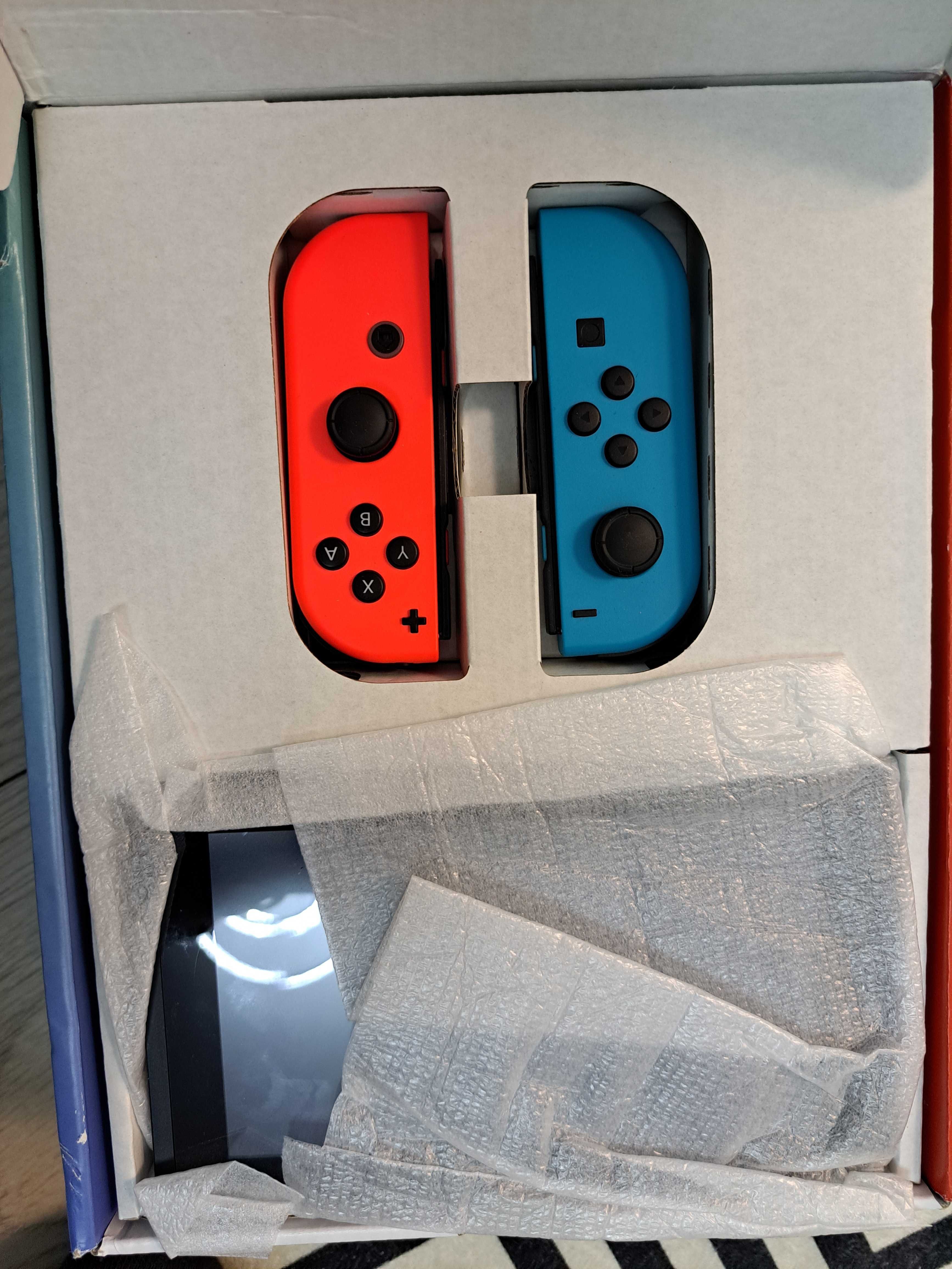 Nintendo switch-utilizat foarte putin cu garantie si factura