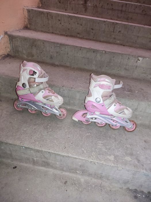 Роликовые коньки