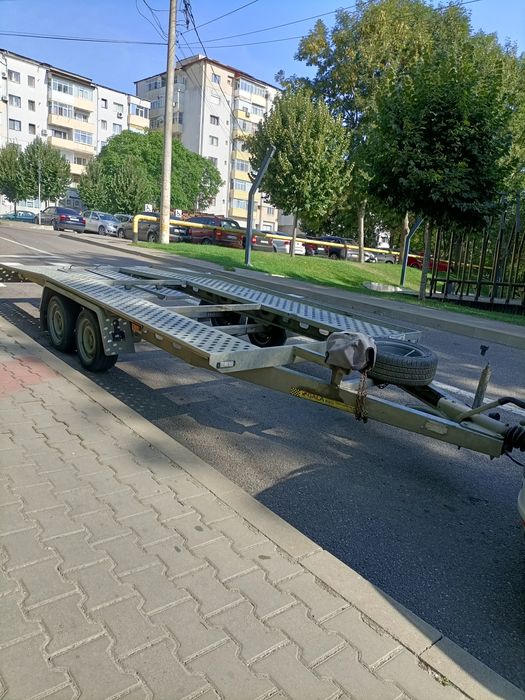Remorcă platformă, se conduce cu categoria, accept schimb...