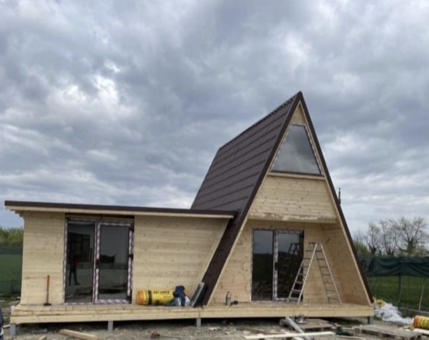 Construim  cabane stil-afrem pe  comandă  clientului