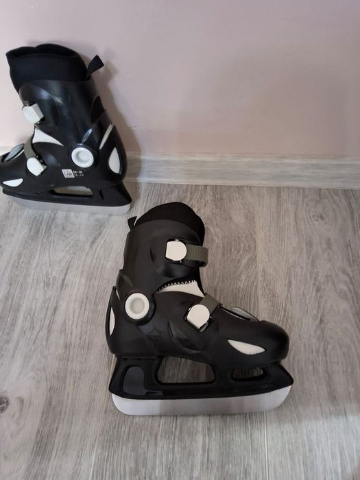 Patine negre reglabila mar.27-30