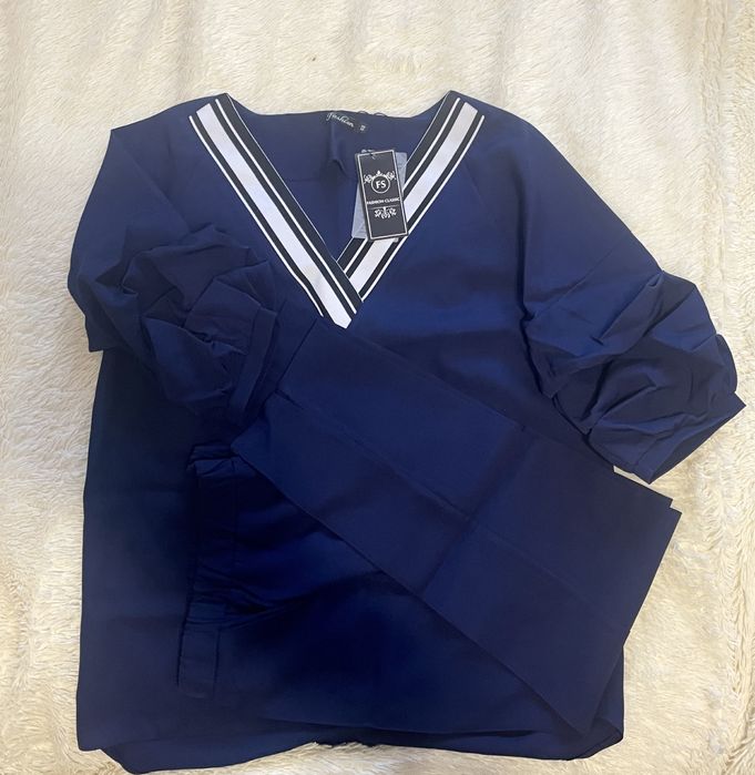 Продам брючный костюм