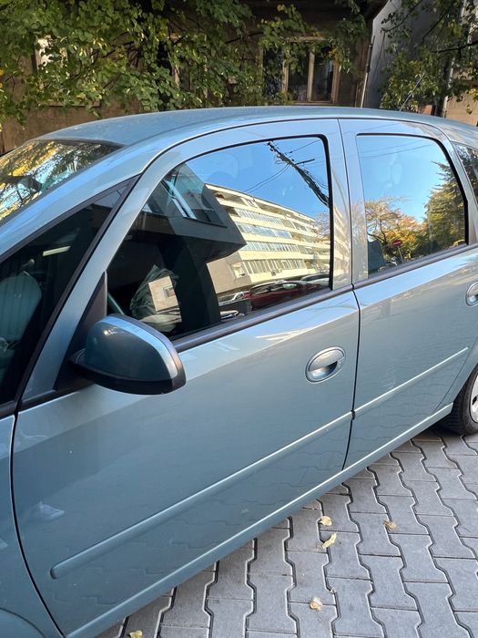 Opel Meriva 1.6 бензин, автоматик, 101
k.c., 2006г.