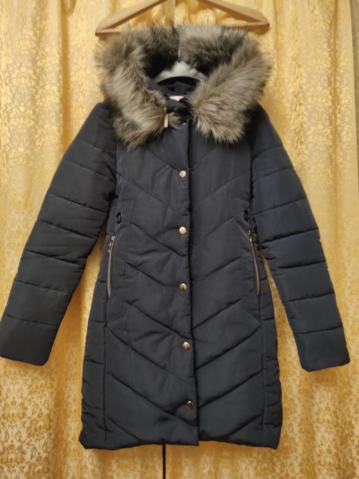 Продам новый пуховик.