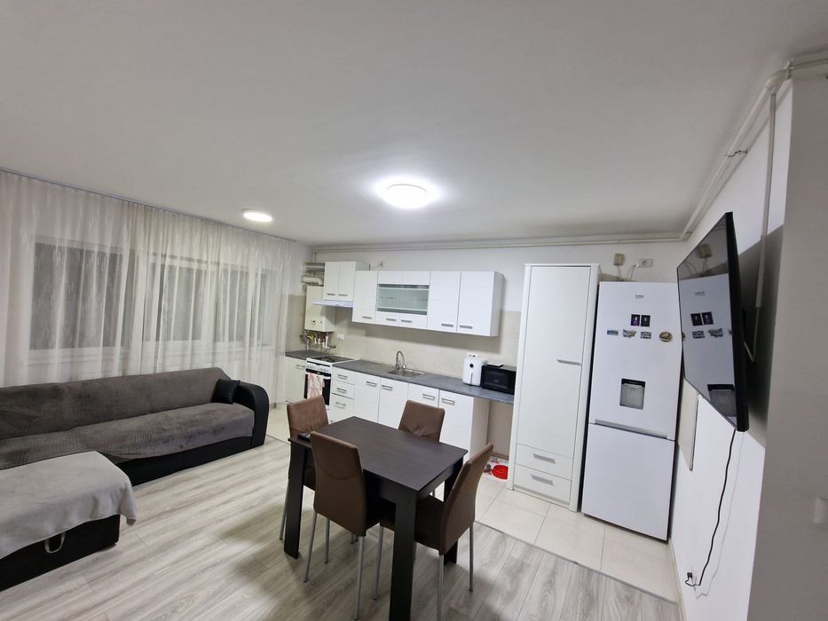 Apartament cu 3 camere+pod privat si parcare