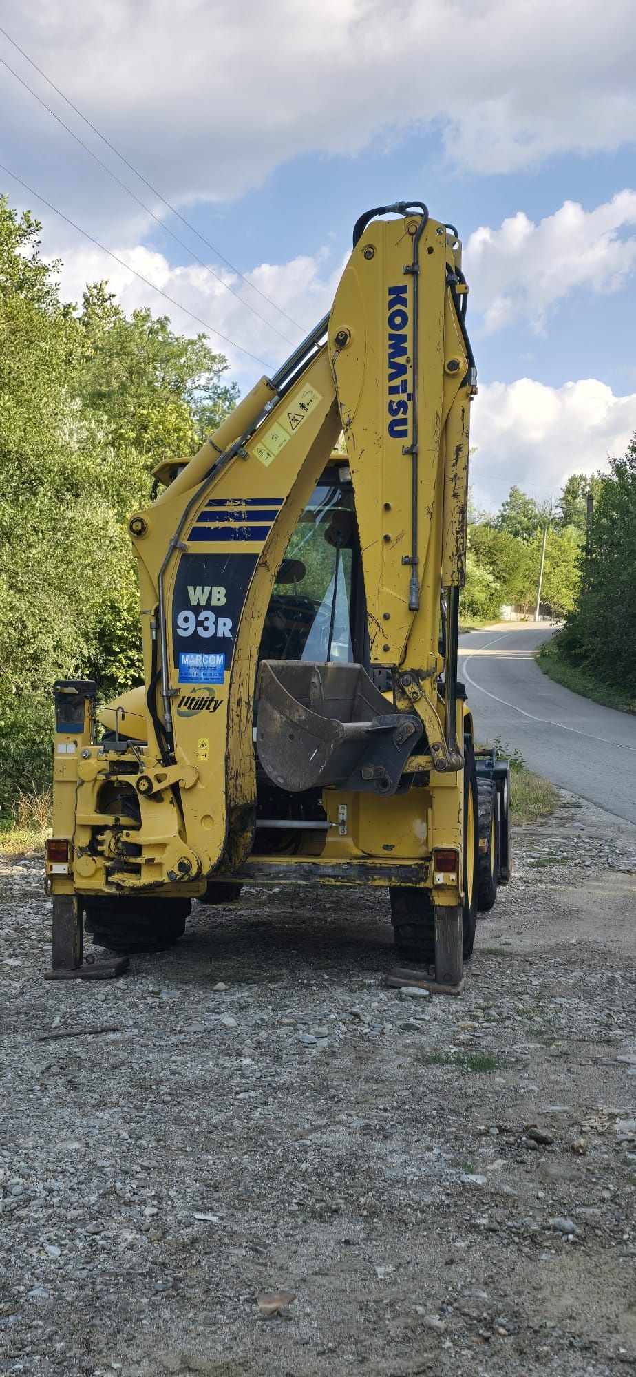 Vând buldoexcavator komatsu wb93r an 2012