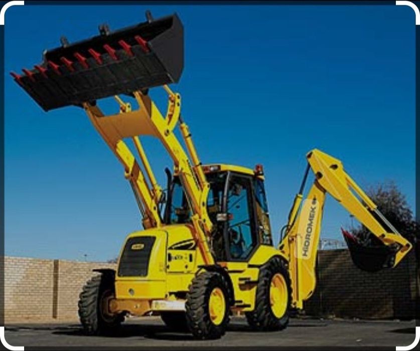 Аренда экскаватора-погрузчика с отбойником трактор Гидромек