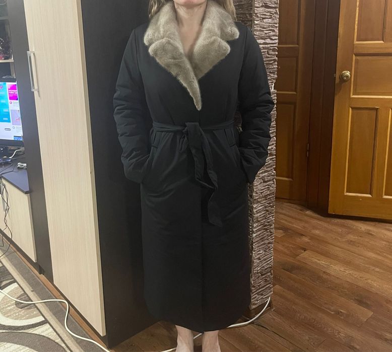 Продам пуховик на верблюжем меху,ворот натуральная норка,теплый,легкий