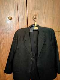 Продам мужской костюм  черного цвета так называемая троечка