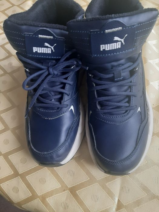 Продавам зимни топли маратонки РUMA номер 41 стелка 26.5  малко носени