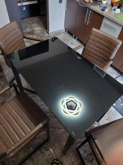 Masă sticlă termorezistentă + 4 scaune piele ecologică