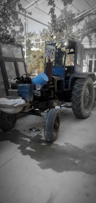 28. Traktor. Sotiladi. Holati alo hamajoyi ishlaydi mator qilingan.