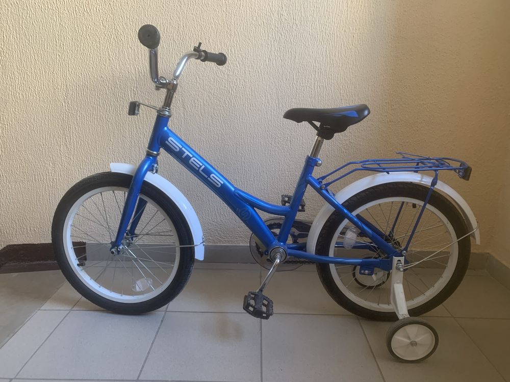 Велосипед двухколесный с боковыми держателями