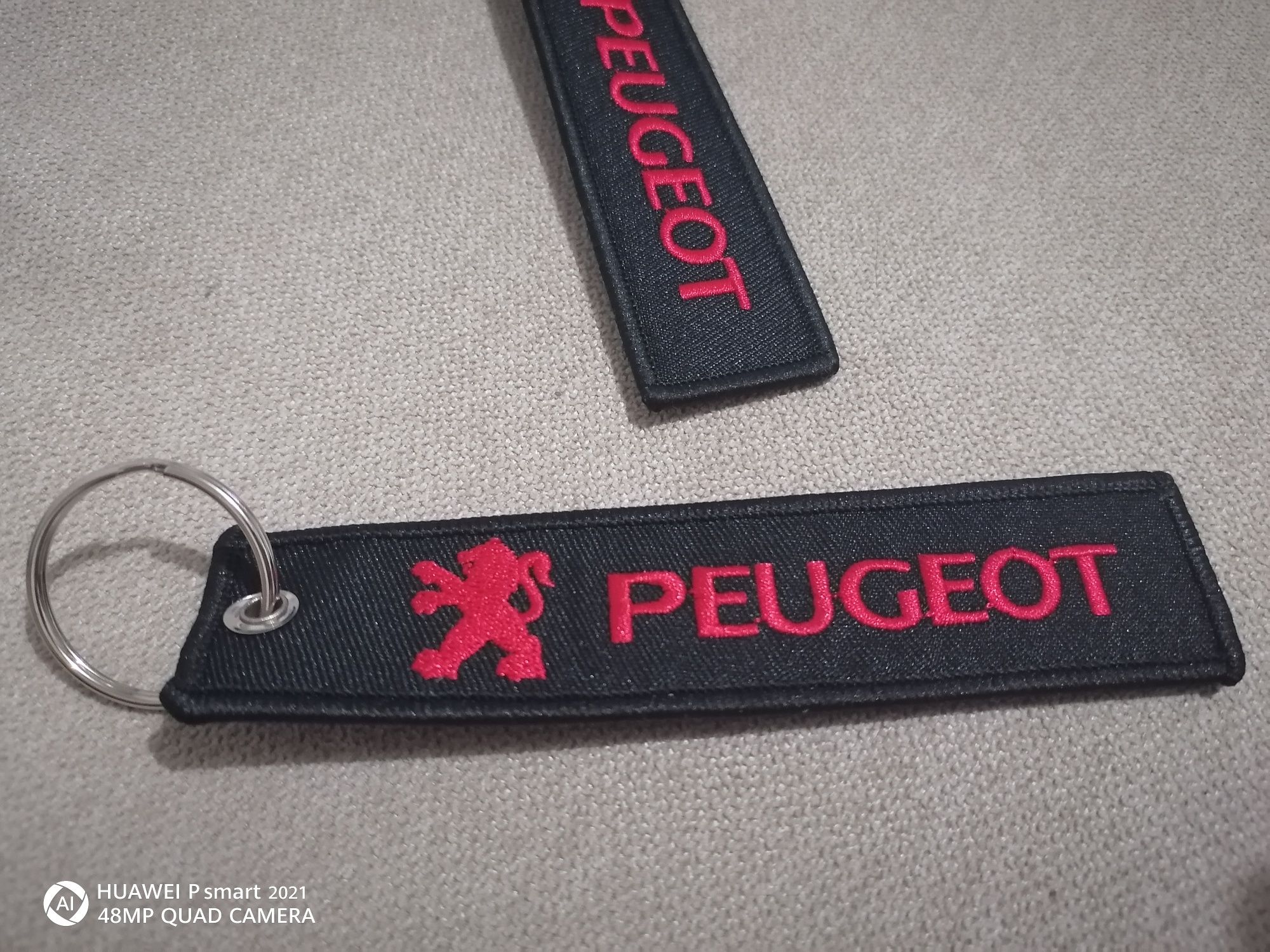 Продавам чисто нов ключодържател Пежо  PEUGEOT
