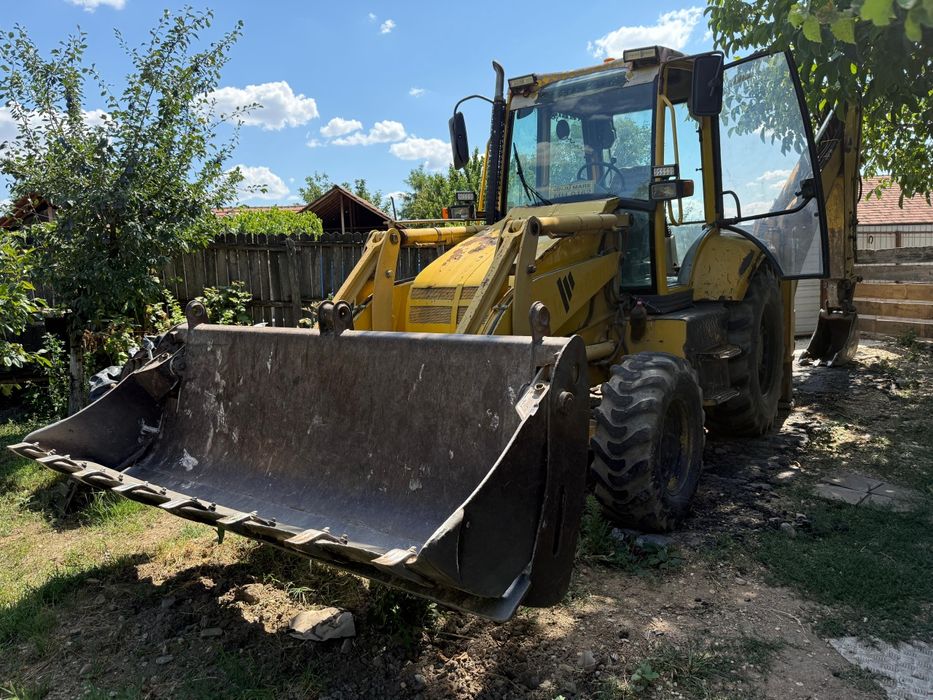 Buldoexcavator Komatsu 93R