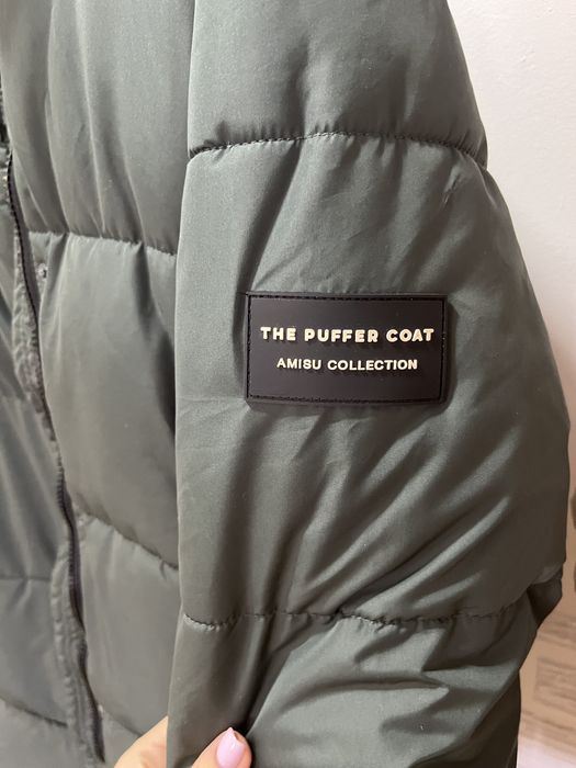 Продам демисезонный пуховик