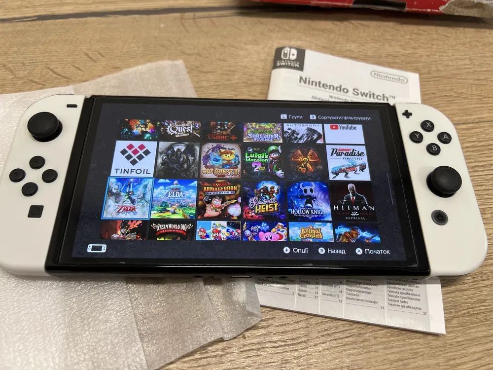 nintendo switch OLED + 35 игри на избор + 512 gb microsd