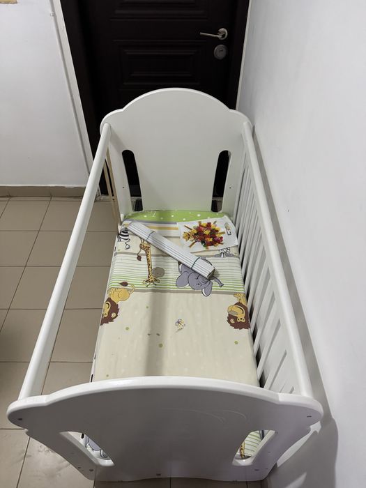 Pătuț copil cu sistem legănare