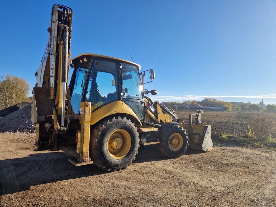 Vand buldoexcavator  cat caterpillar 428F fara ad blue