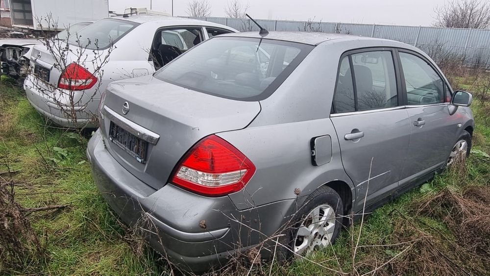 Nissan tiida capota aripa usi portbagaj stopuri baractrager armatura