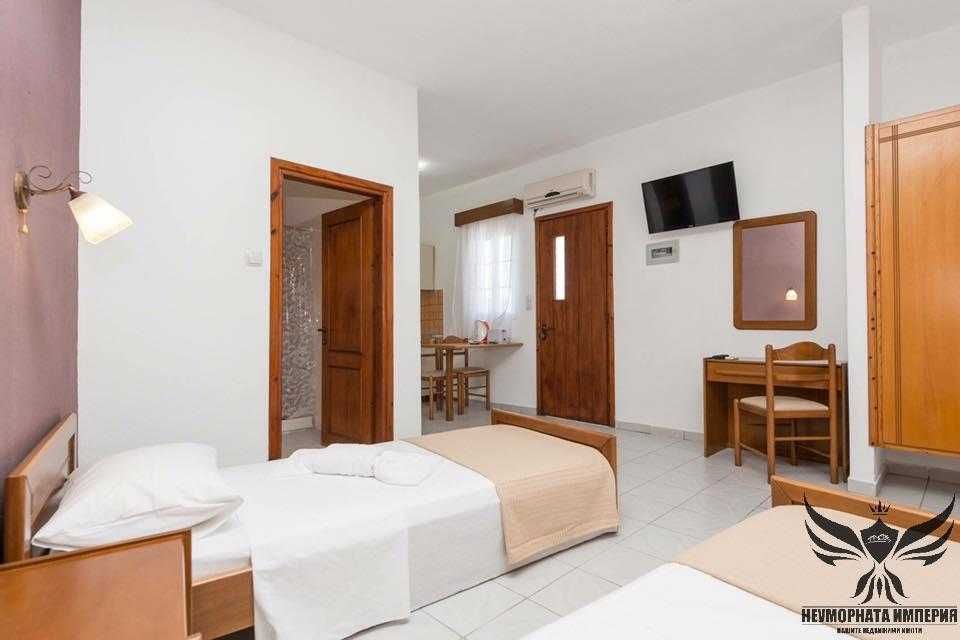 Продавам хотел с РЗП 2400кв. и парцел 1600кв. на остров Тасос, Гърция