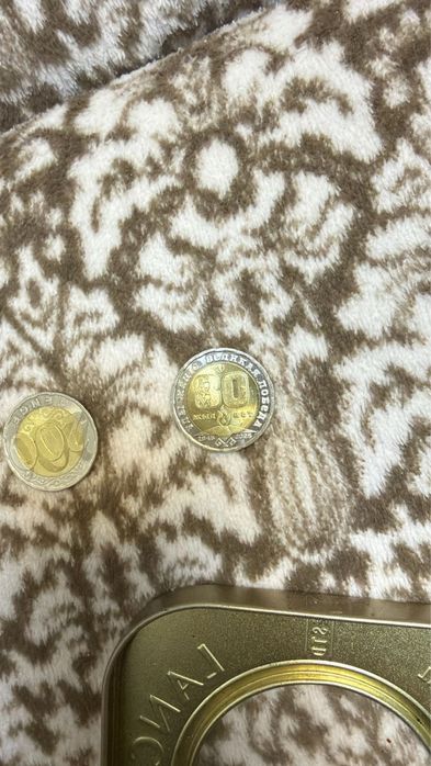 Продам коллекционную монету 200тг