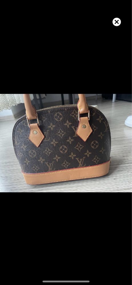 Genti Louis Vuitton