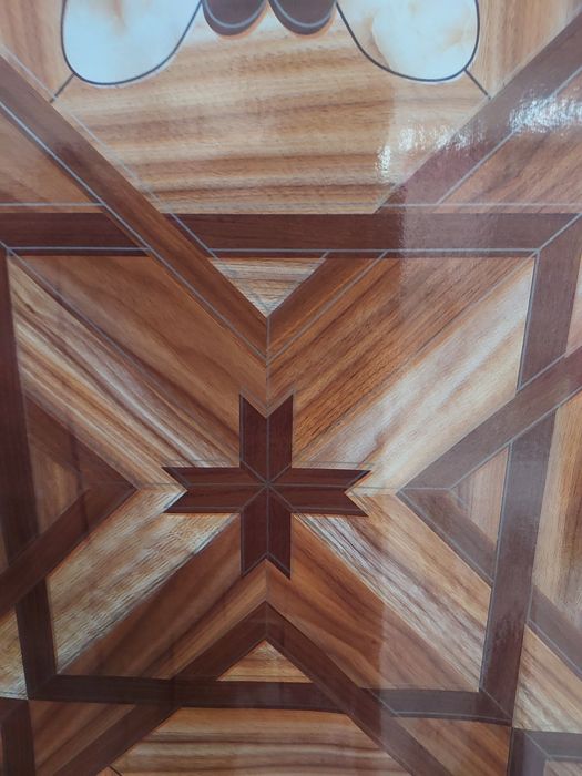 Linoleu model floare maron 519lei, floare gri549 lei 2x20 m rola