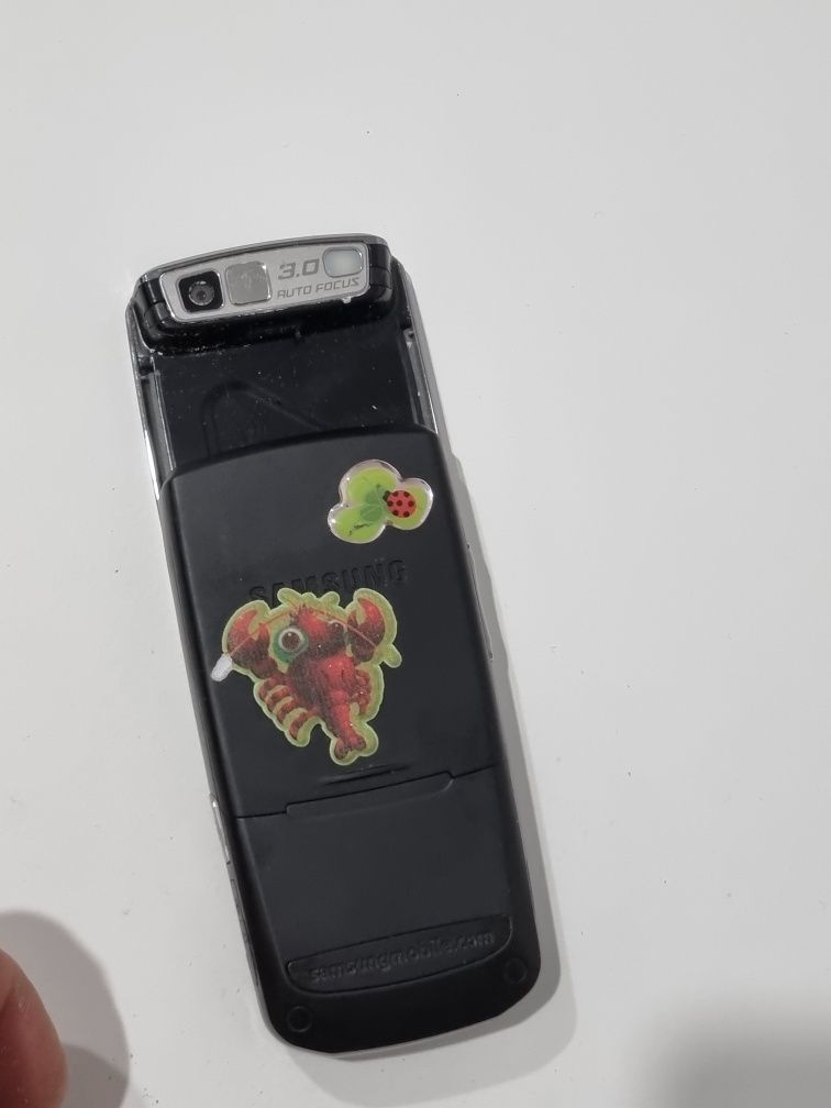 Telefon pe sina - slide,  D900i , cu încărcător