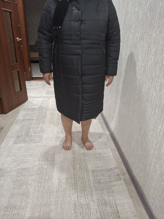 Продам зимний пуховик.  Цена 15 000 тг