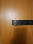 curea Louis Vuitton gold on black
