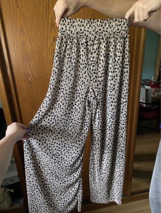 Pantaloni evazați animal print