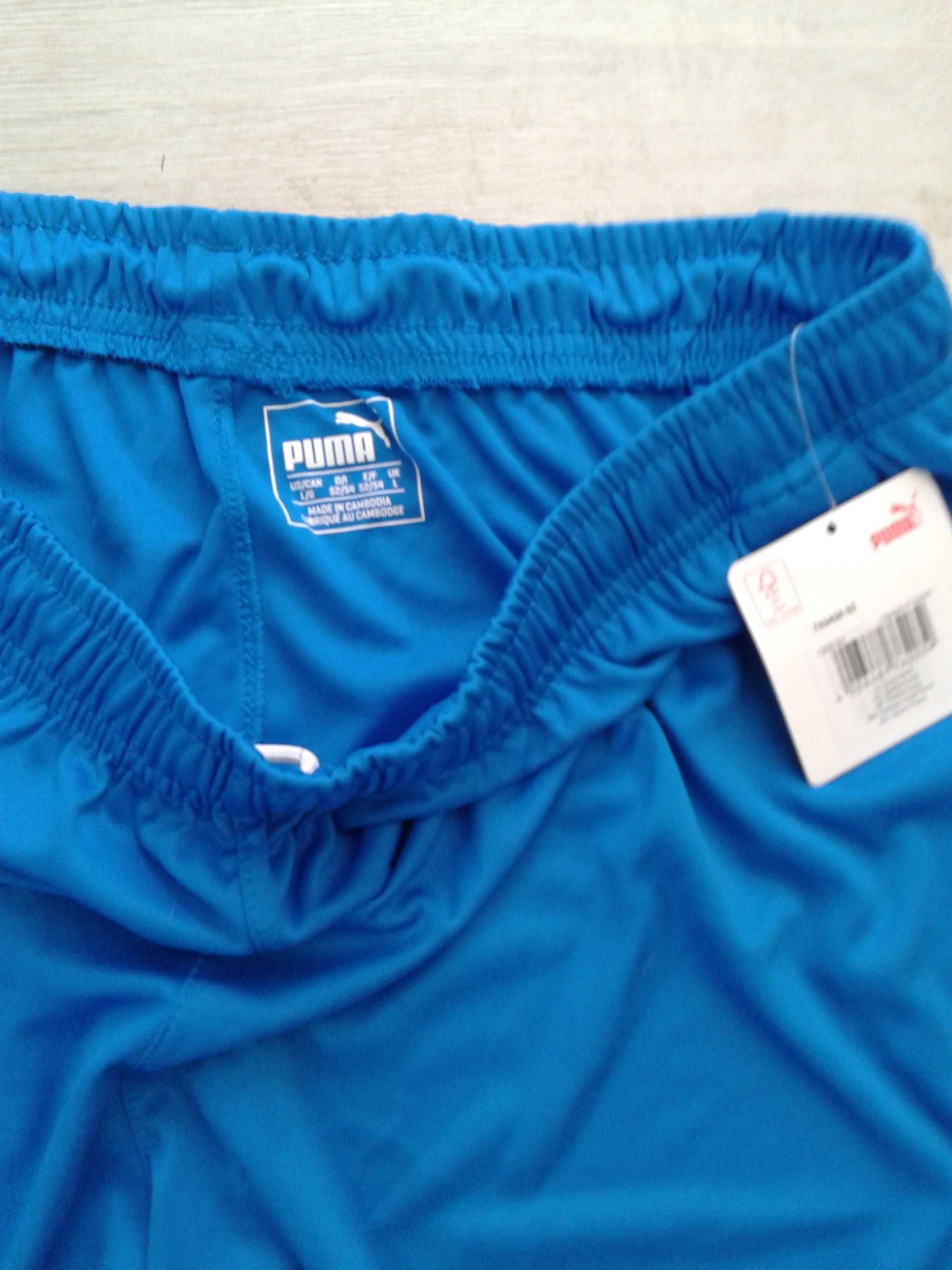 Къси нови панталони PUMA размер L.
