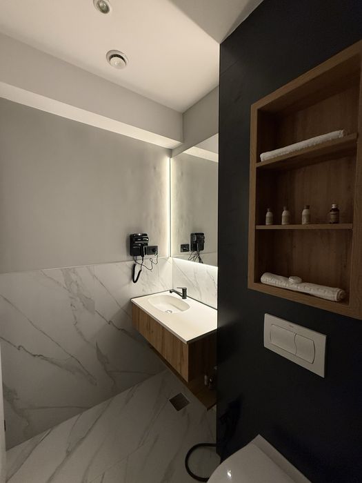 Elmax Aparthotel ofera camere in regim hotelier