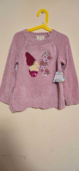 Pulover Btween copii cu eticheta 122 - 128 cm.