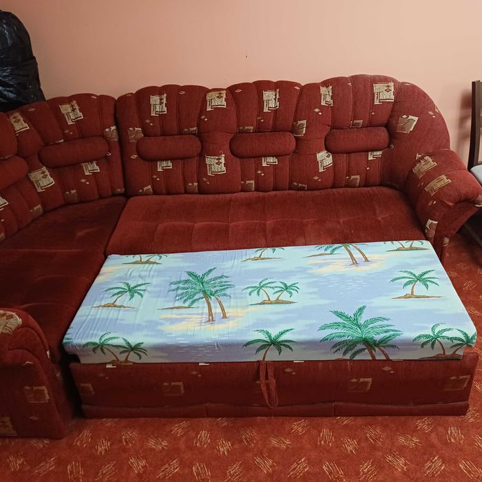 Ъглов разтегателен диван.