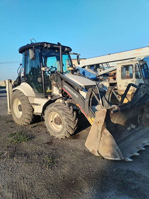 Услуги экскаватора погрузчика Ямобура