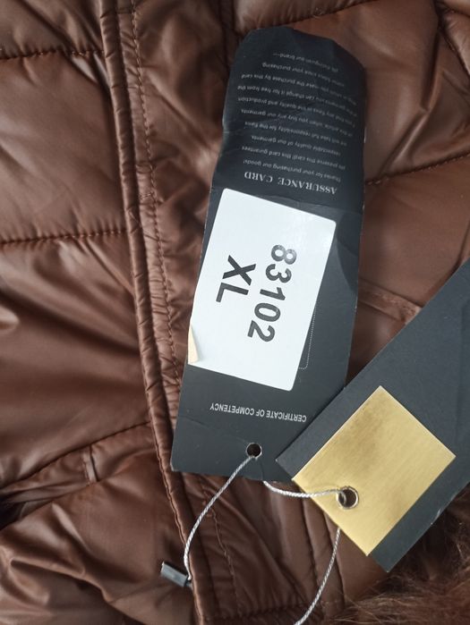 Куртка новый коричневый 46 размер