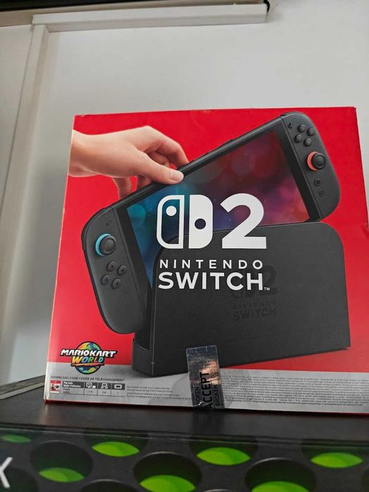 Nintendo Switch 2 + controller + jocuri