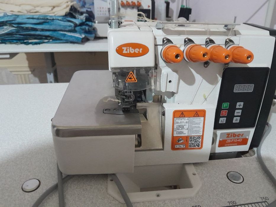 Tikuv mashinasi holati yangi.