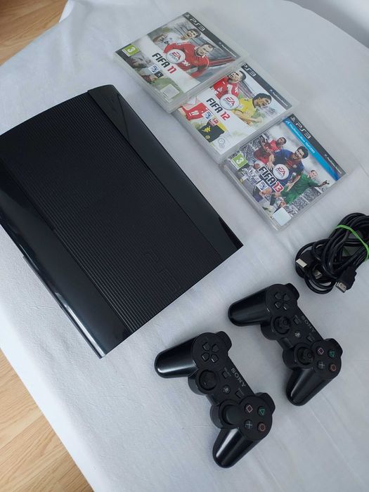 Ps3 super slim,cu 2 manete +jocuri