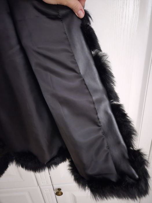 Vesta blana artificiala